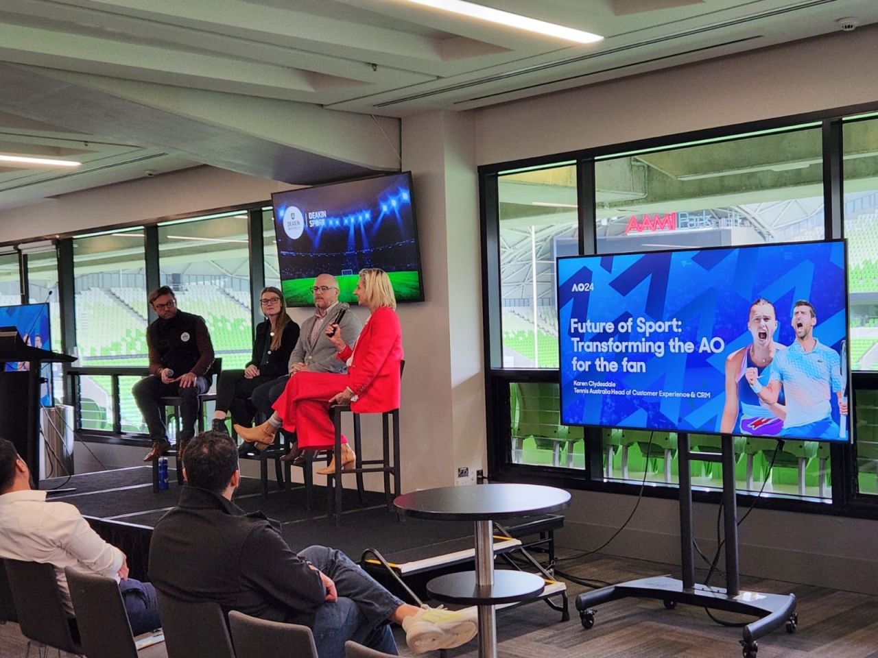 KC speaking on a panel at Marvel Stadium
